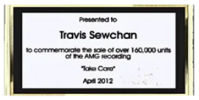 Engraved plate: presented to Travis Sewchan